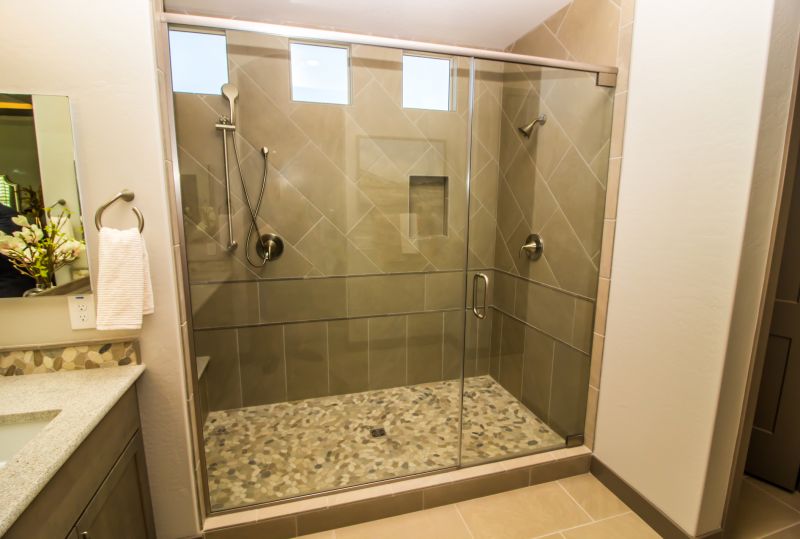 Walk-in Shower Featuring Stone Accents